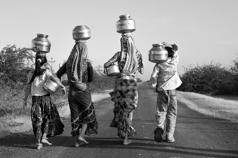 Human Right to Water in Kutch district, Gujarat - Traversing a long journey back home with heavy loads of water